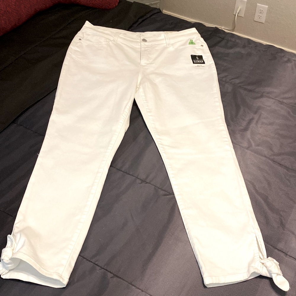 Womens jeans, size 14, with cute tie at ankle. New never worn.